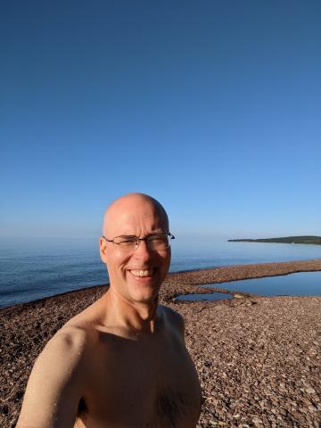 Matthew slightly wet next to Lake Superior