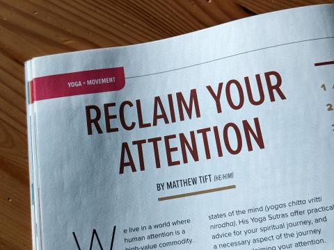 A picture of magzine with an article titled reclaim your attention by matthew tift