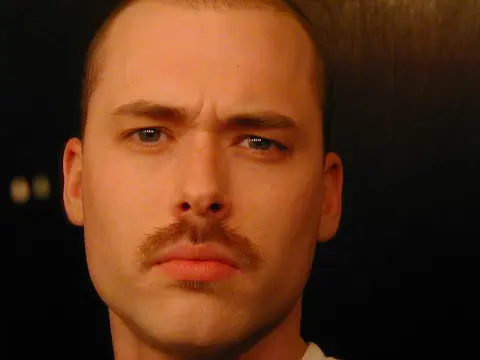 matthew in 2002 with a brown mustache