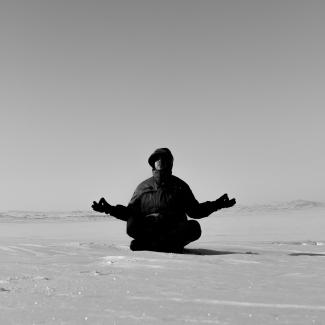 A Person Meditating on Snow from pexels.com/photo/a-person-meditating-on-snow-8722676