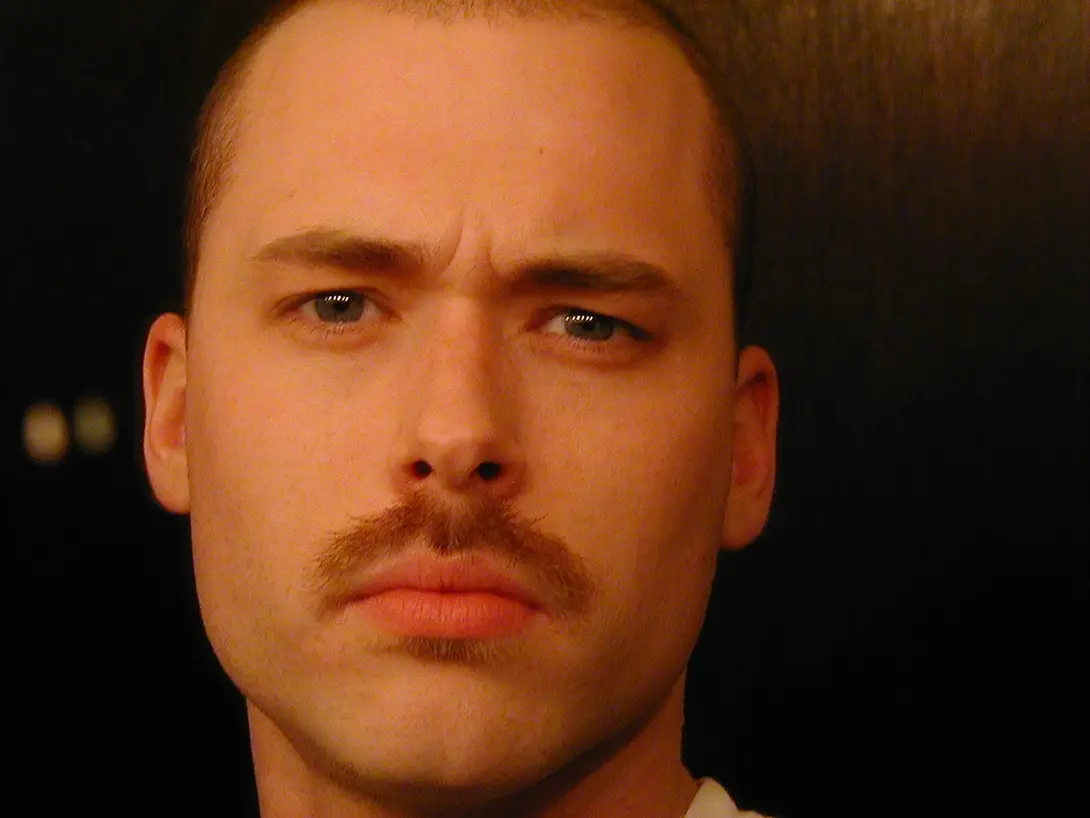 matthew in 2002 with a brown mustache